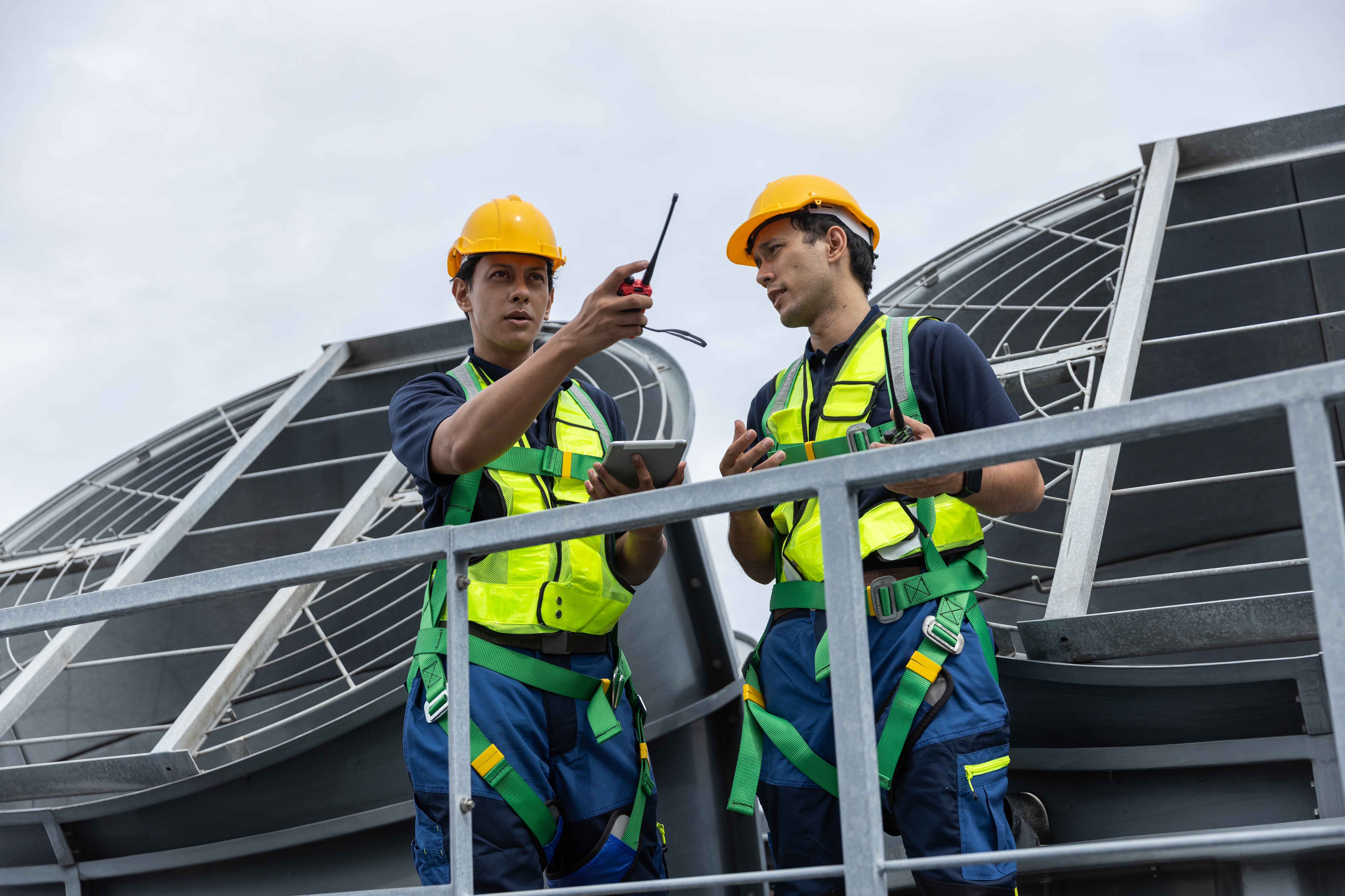 Engineers evaluating geotechnical site conditions before foundation design