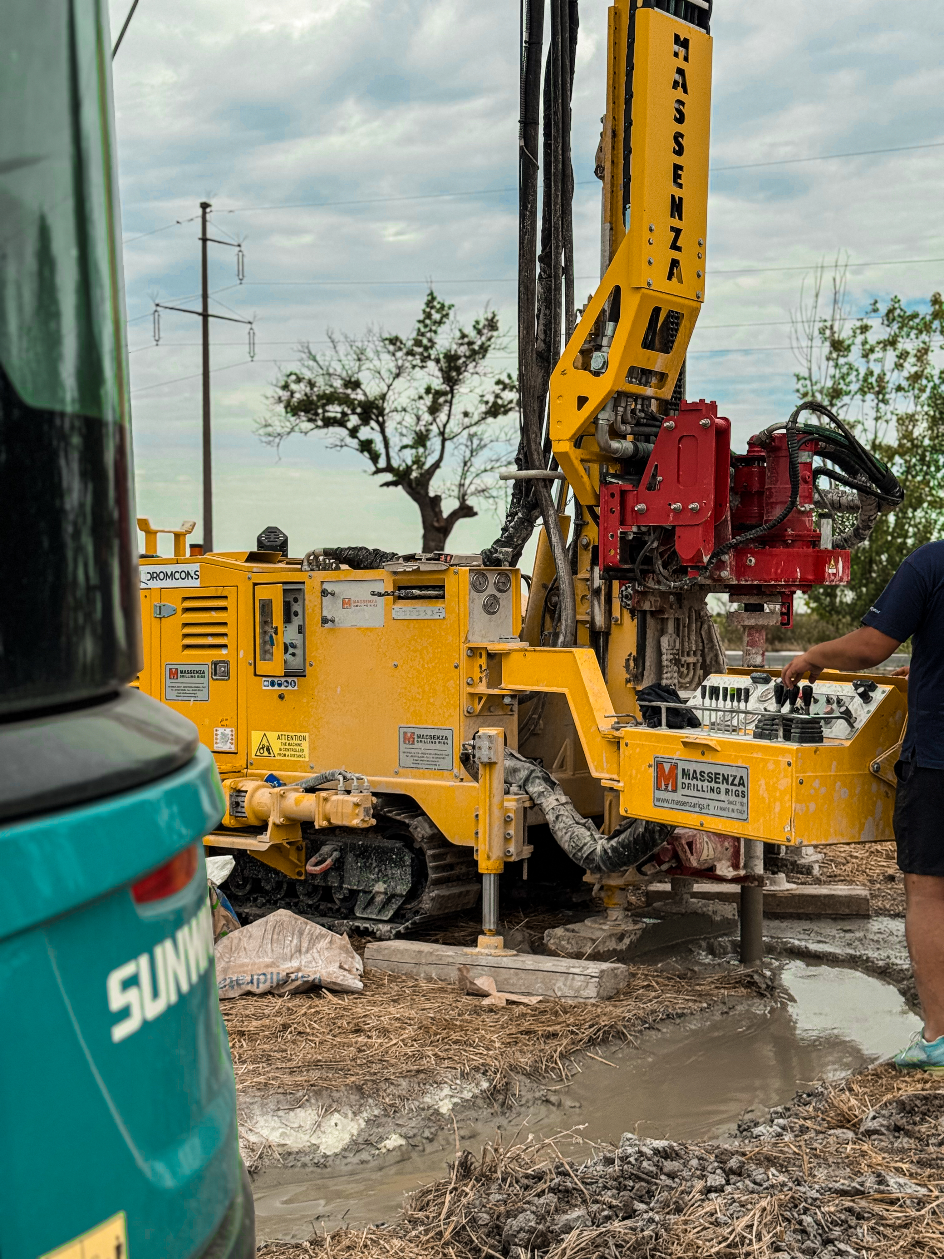 Yellow Massenza MI5 rig used by Dromcons for geotechnical and exploration drilling